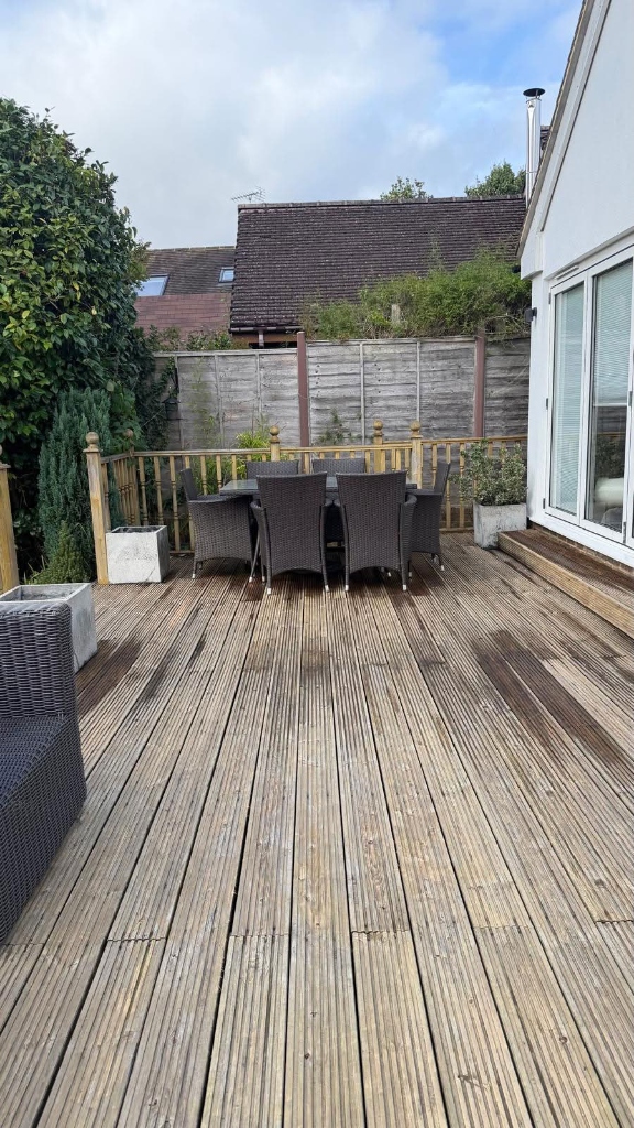 Before power washing decking